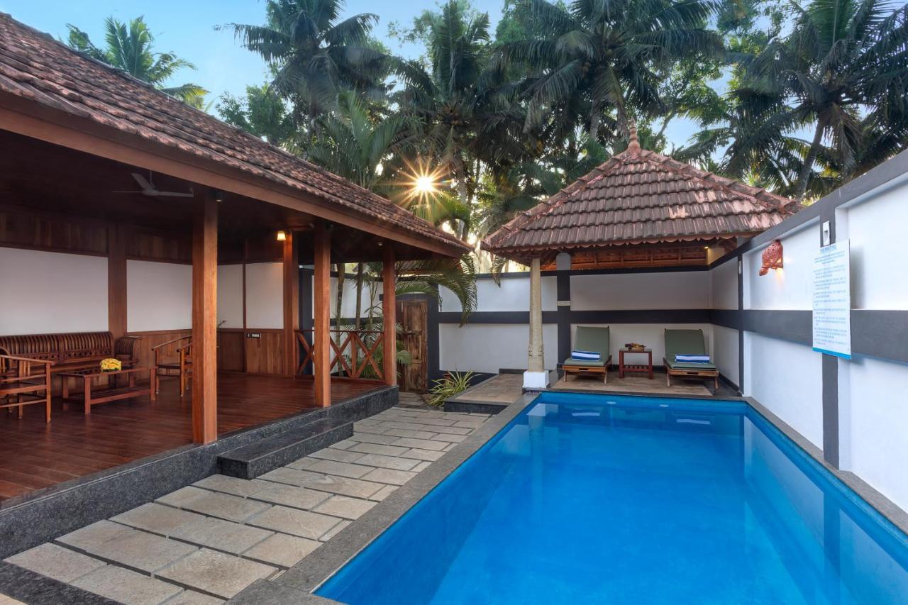 เอสชัวรี สโรวร ปอร์ติโก ปูวาร์ ไอส์แลนด์ Hotel Poovar ภายนอก รูปภาพ