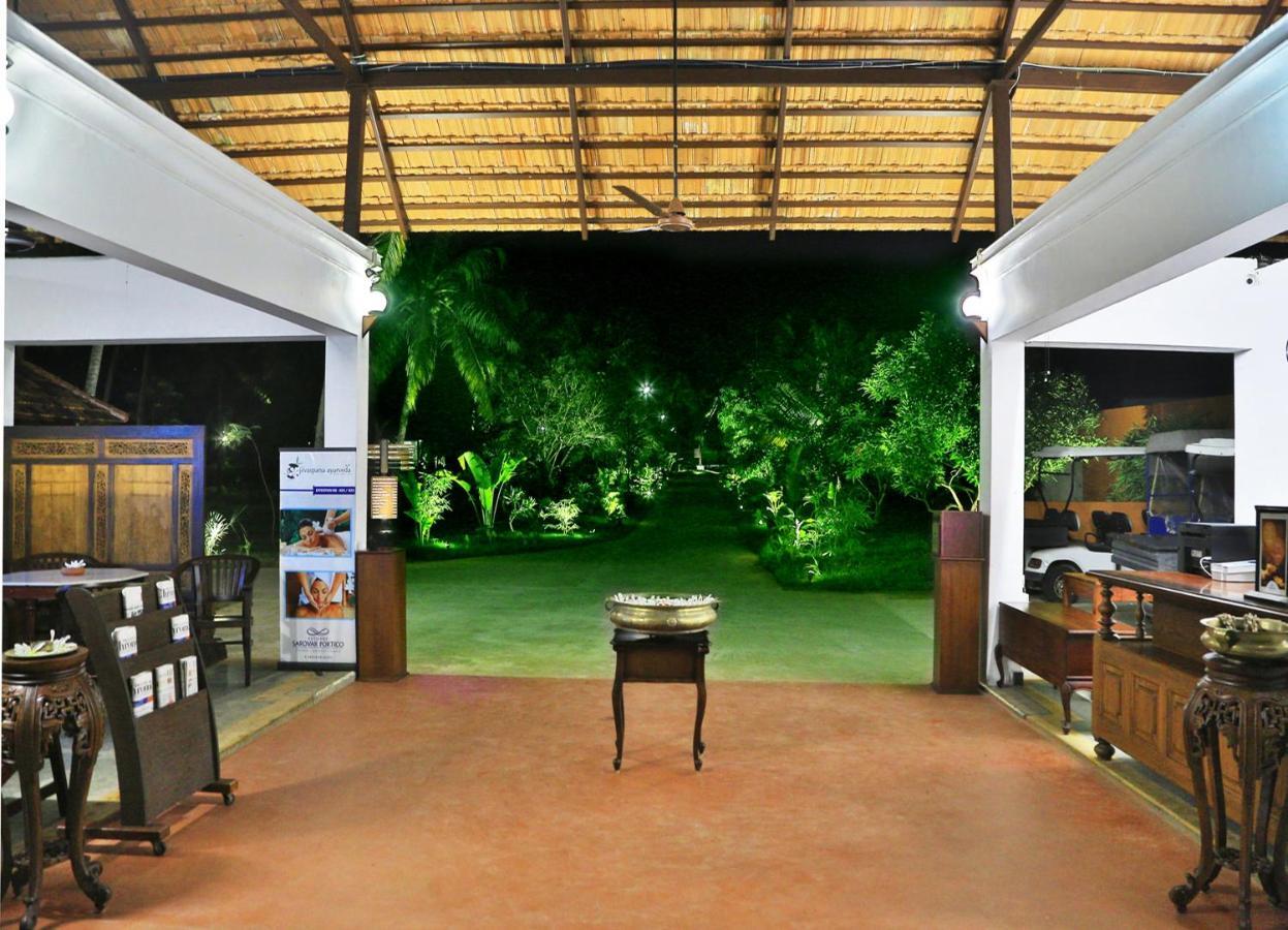 เอสชัวรี สโรวร ปอร์ติโก ปูวาร์ ไอส์แลนด์ Hotel Poovar ภายนอก รูปภาพ