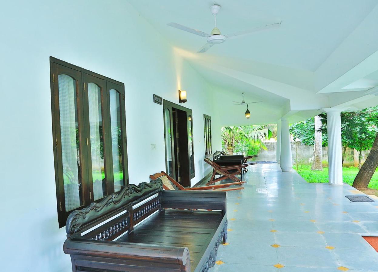 เอสชัวรี สโรวร ปอร์ติโก ปูวาร์ ไอส์แลนด์ Hotel Poovar ภายนอก รูปภาพ