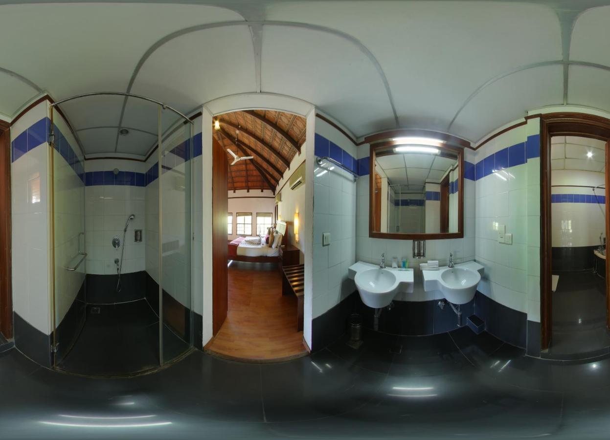 เอสชัวรี สโรวร ปอร์ติโก ปูวาร์ ไอส์แลนด์ Hotel Poovar ภายนอก รูปภาพ